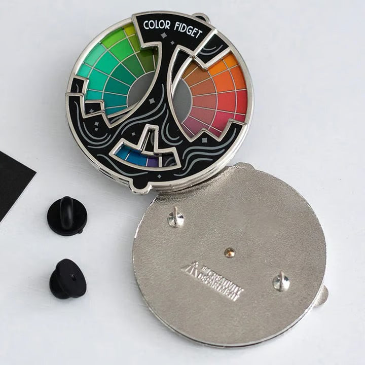 SpinGleam – Interactive Colorful Fidget Pin
