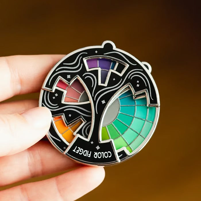SpinGleam – Interactive Colorful Fidget Pin