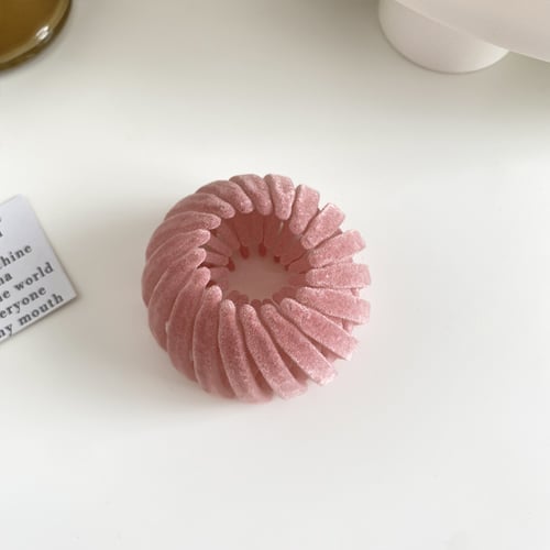 FeatherTwirl – Messy Chic Hair Clip