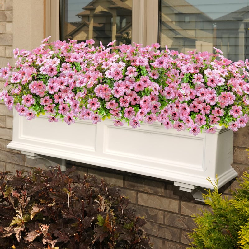 GardenGlow – Weatherproof Faux Flowers for Outdoor Beauty