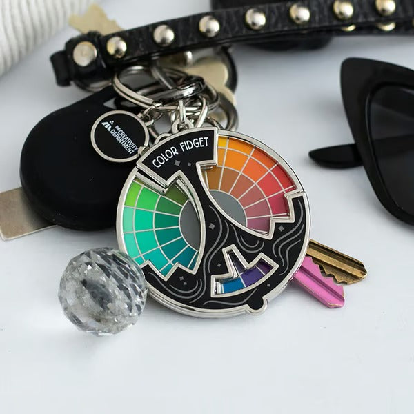 SpinGleam – Interactive Colorful Fidget Pin
