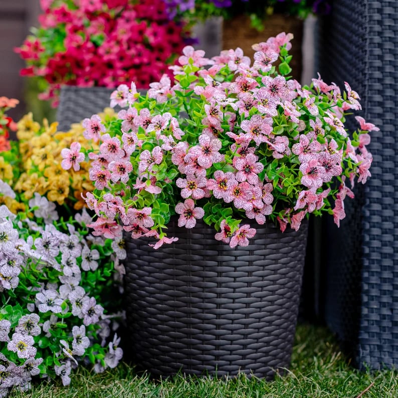 GardenGlow – Weatherproof Faux Flowers for Outdoor Beauty