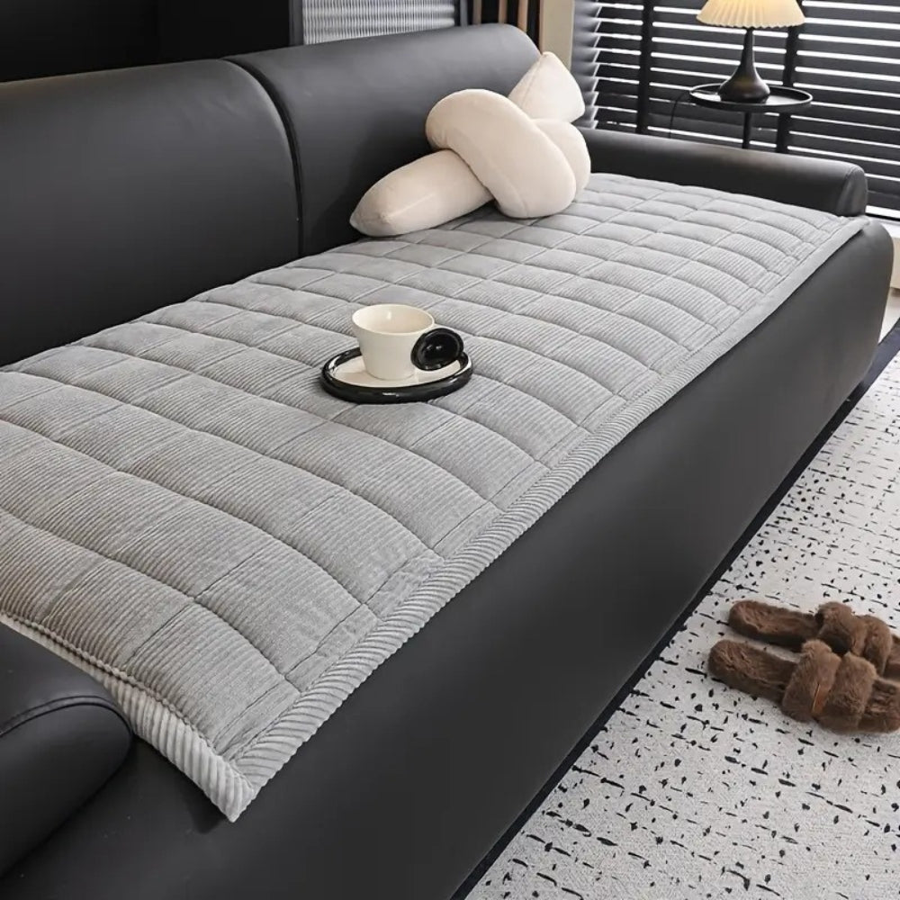 SofaNest – Metro Line Quilted Couch Cover Mat for Comfort & Care