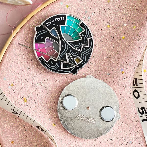 SpinGleam – Interactive Colorful Fidget Pin