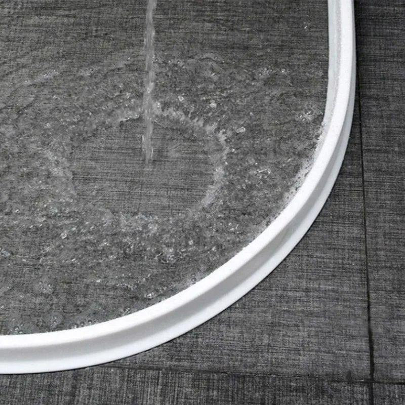 AquaGuard – Flexible Shower Barrier