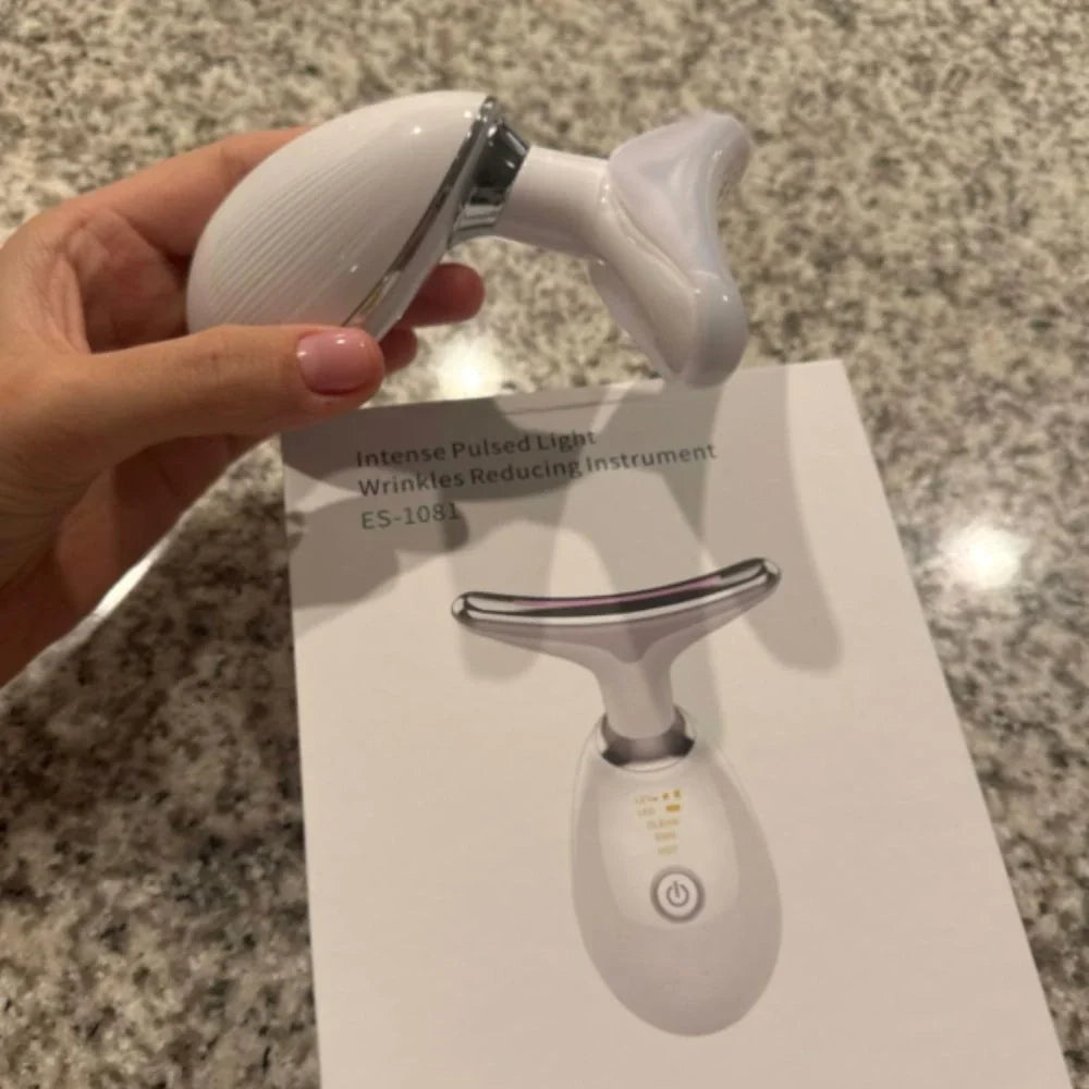 Device being unboxed on bathroom counter for at home skincare